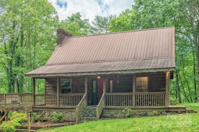 2610 Indian Grave Rd, Lenoir, NC 28645 - view of front of property featuring a chimney, a porch, and metal roof