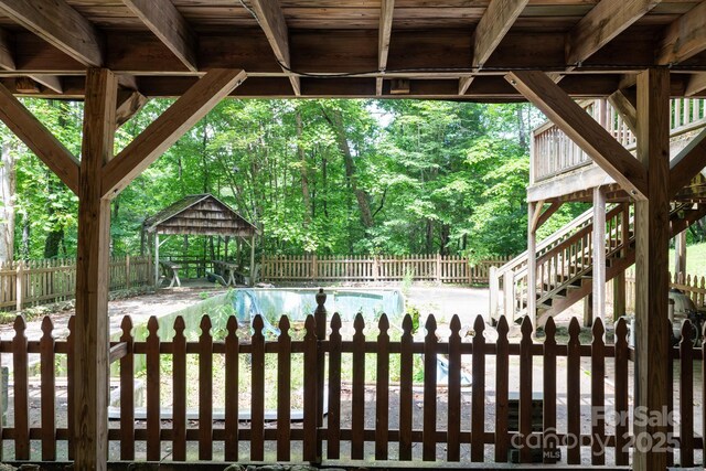 2610 Indian Grave Rd, Lenoir, NC 28645 - fenced backyard featuring stairs and a gazebo