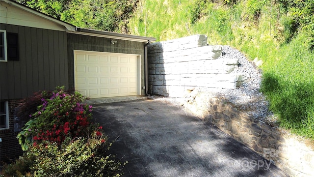 857 Country Club Dr, Maggie Valley, NC 28751 - garage with aphalt driveway