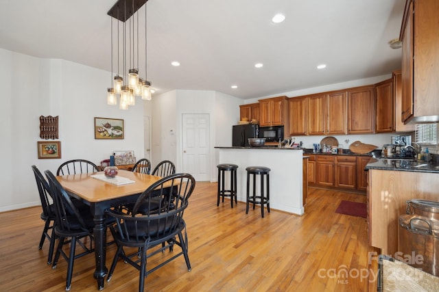 1102 High Brook Dr, Waxhaw, NC 28173 - dining space featuring light wood finished floors and recessed lighting