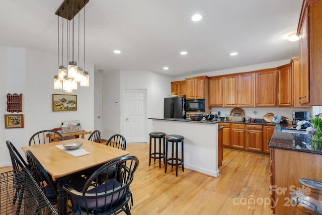 1102 High Brook Dr, Waxhaw, NC 28173 - dining area with light wood-type flooring, recessed lighting, and a chandelier