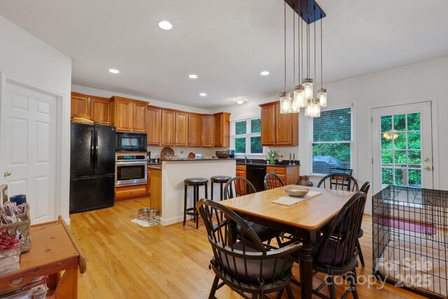 1102 High Brook Dr, Waxhaw, NC 28173 - dining space featuring light wood finished floors and recessed lighting
