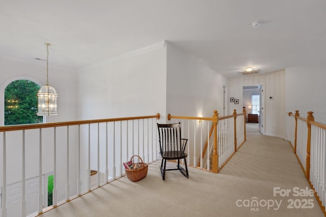 1102 High Brook Dr, Waxhaw, NC 28173 - hall with carpet floors, an upstairs landing, and a chandelier