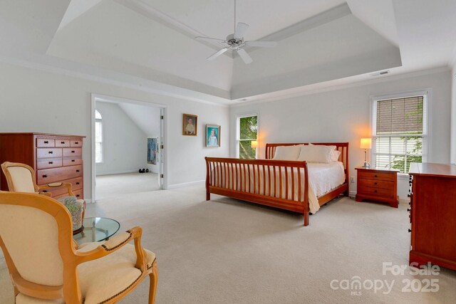 1102 High Brook Dr, Waxhaw, NC 28173 - bedroom featuring a raised ceiling, light colored carpet, multiple windows, and crown molding