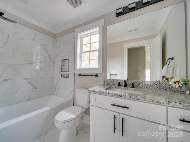 full bathroom featuring toilet, vanity, marble finish floor, visible vents, and ornamental molding