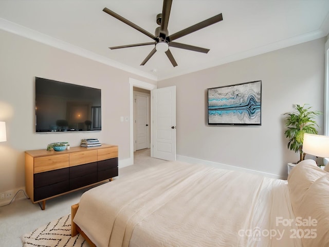 bedroom featuring baseboards, ornamental molding, ceiling fan, and light carpet