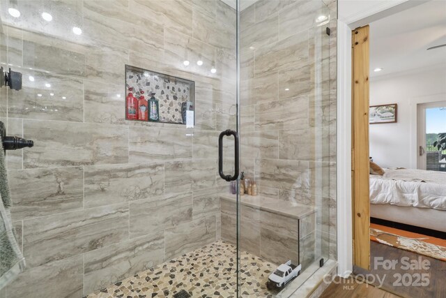 ensuite bathroom with a stall shower and ensuite bath