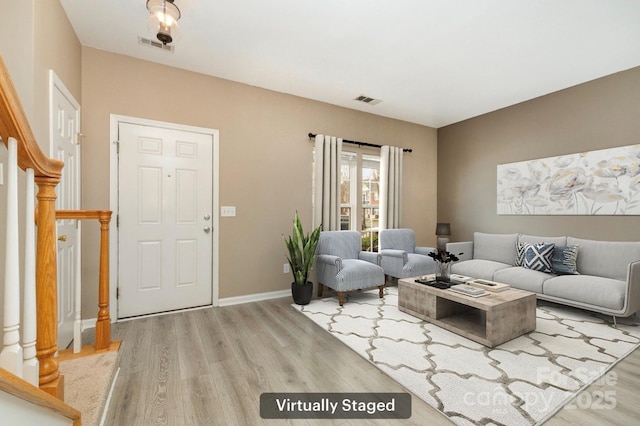 1720 Chamberside Dr, Rock Hill, SC 29730 - living room with baseboards, stairs, visible vents, and light wood-style floors