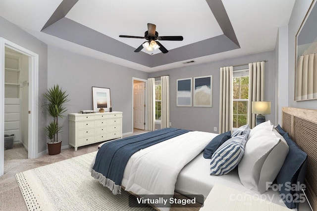 1720 Chamberside Dr, Rock Hill, SC 29730 - bedroom with visible vents, baseboards, ceiling fan, a raised ceiling, and light colored carpet