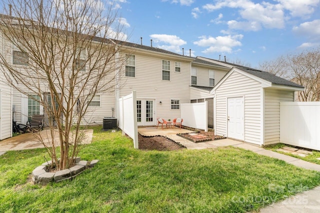 1720 Chamberside Dr, Rock Hill, SC 29730 - back of house featuring french doors, fence, an outdoor structure, a patio, and a yard