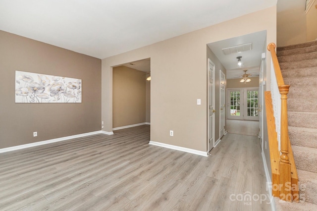 1720 Chamberside Dr, Rock Hill, SC 29730 - spare room with light wood-style floors, baseboards, stairway, and visible vents
