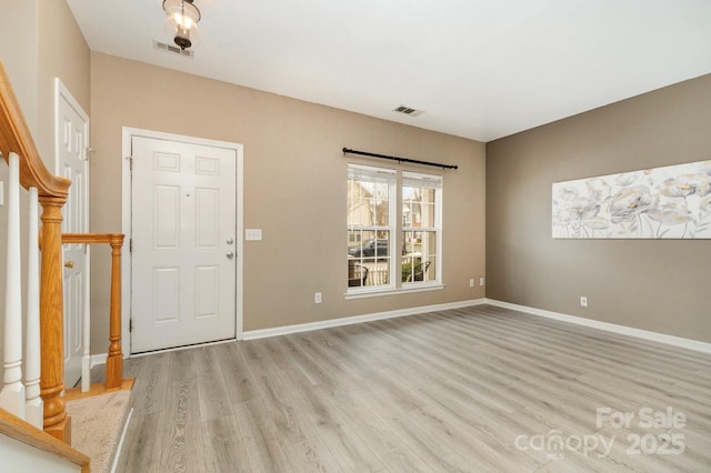 1720 Chamberside Dr, Rock Hill, SC 29730 - foyer featuring baseboards, light wood-type flooring, visible vents, and stairs