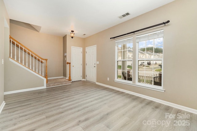 1720 Chamberside Dr, Rock Hill, SC 29730 - foyer with baseboards, stairs, visible vents, and wood finished floors