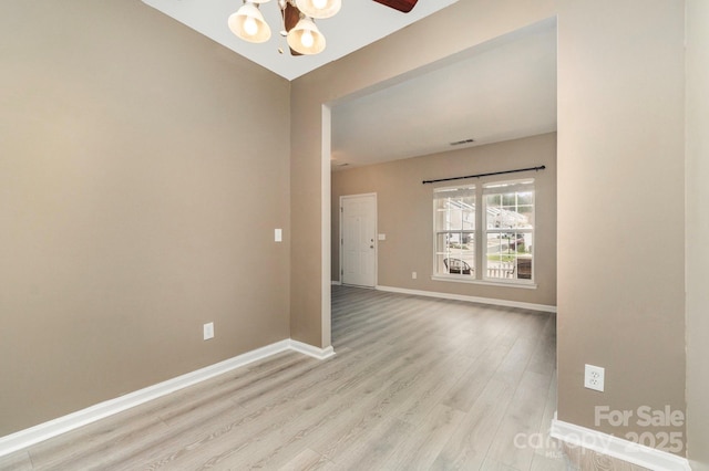1720 Chamberside Dr, Rock Hill, SC 29730 - spare room with baseboards, visible vents, a chandelier, and light wood-style floors