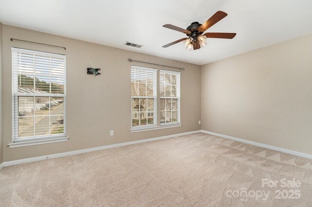1720 Chamberside Dr, Rock Hill, SC 29730 - carpeted spare room featuring baseboards, ceiling fan, and visible vents