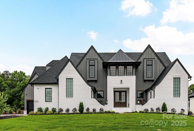 406 Sugar Maple Ln, Weddington, NC 28104 - french country inspired facade with a front lawn, french doors, a garage, and stucco siding