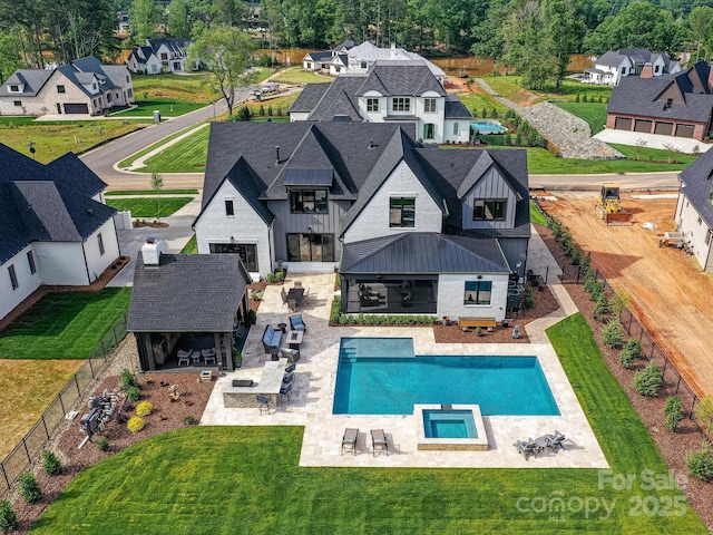406 Sugar Maple Ln, Weddington, NC 28104 - back of property with board and batten siding, a residential view, and a patio area