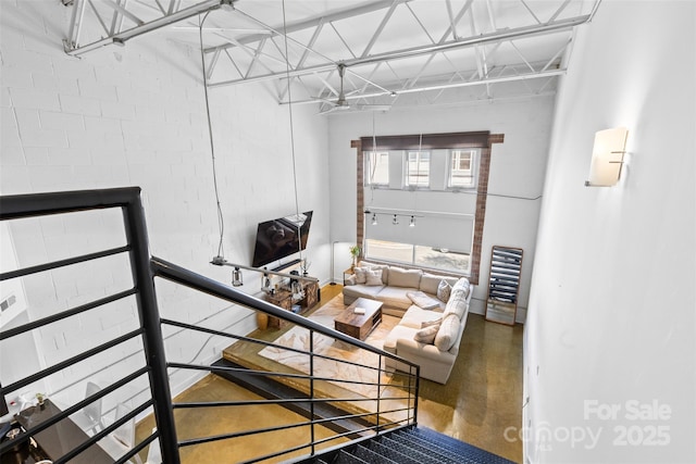 925 Westmere Ave, Charlotte, NC 28208 - stairway with brick wall and concrete flooring