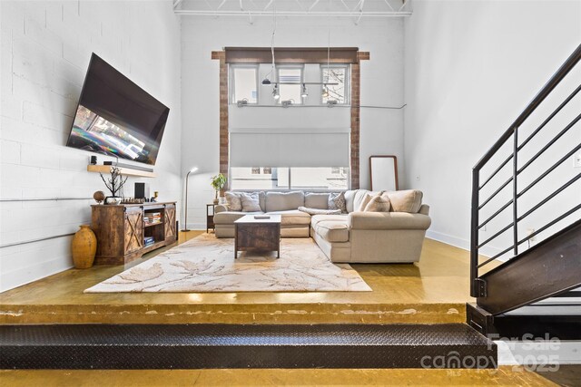925 Westmere Ave, Charlotte, NC 28208 - living area with baseboards and a high ceiling