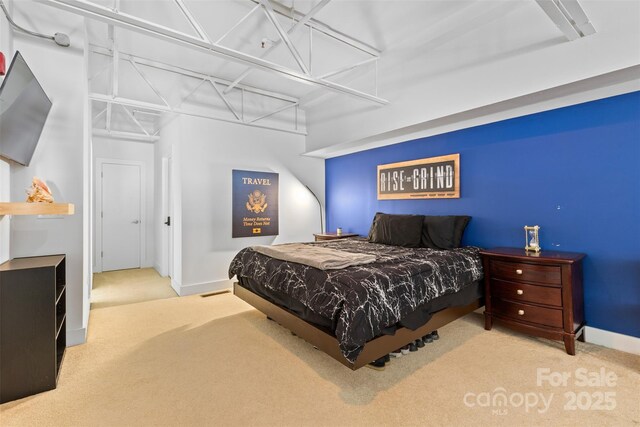 925 Westmere Ave, Charlotte, NC 28208 - bedroom with baseboards and carpet