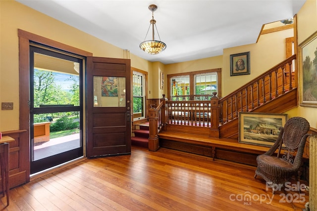 156 Cumberland Ave, Asheville, NC 28801 - entryway with stairs, light wood-type flooring, and a chandelier