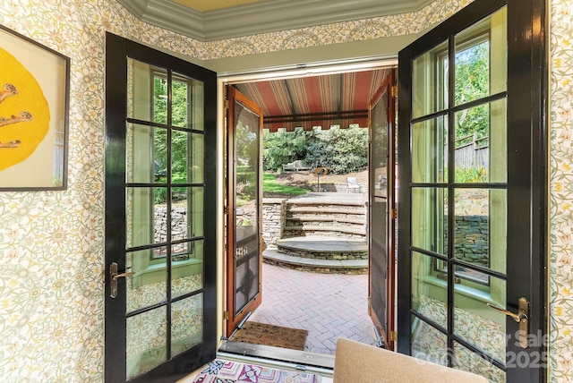 156 Cumberland Ave, Asheville, NC 28801 - doorway featuring wallpapered walls, brick patterned flooring, crown molding, healthy amount of natural light, and french doors