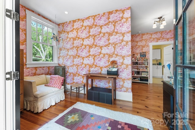 156 Cumberland Ave, Asheville, NC 28801 - living area featuring wallpapered walls and wood finished floors