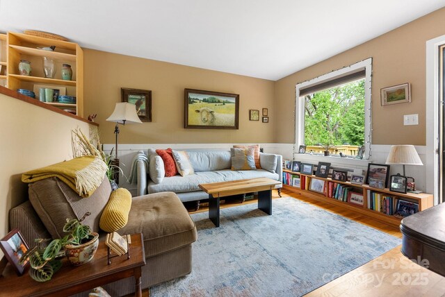 156 Cumberland Ave, Asheville, NC 28801 - living room with wood finished floors and wainscoting