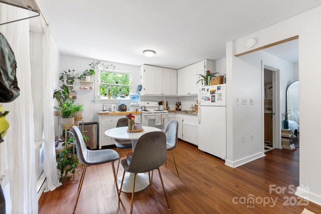 156 Cumberland Ave, Asheville, NC 28801 - dining room featuring dark wood-style flooring and baseboards