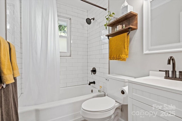 full bath with toilet, vanity, and shower / bath combination with curtain