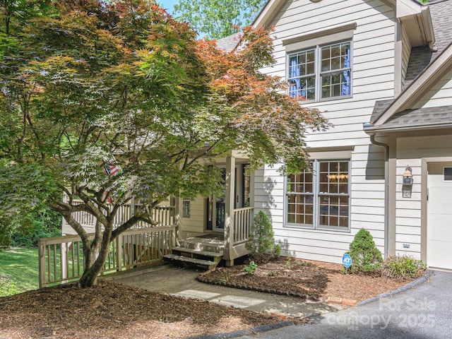 102 Galloway Dr, Asheville, NC 28803 - doorway to property featuring roof with shingles
