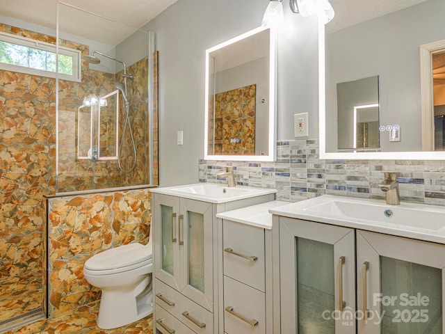 102 Galloway Dr, Asheville, NC 28803 - bathroom with toilet, a tile shower, a sink, and two vanities