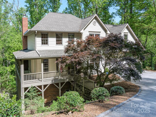 102 Galloway Dr, Asheville, NC 28803 - view of front of property featuring roof with shingles, covered porch, and a chimney