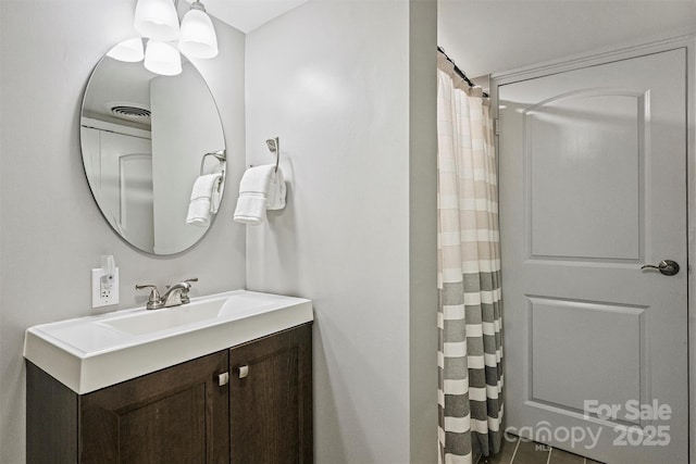 bathroom with vanity and a shower with curtain