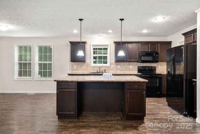 61 Evelyn Acres Dr, Asheville, NC 28806 - kitchen featuring black appliances, dark brown cabinetry, a textured ceiling, decorative backsplash, and dark wood-style flooring