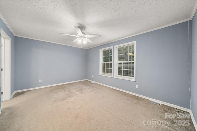 61 Evelyn Acres Dr, Asheville, NC 28806 - spare room featuring crown molding, ceiling fan, a textured ceiling, and carpet flooring