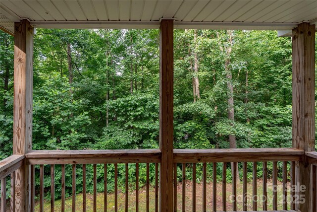 61 Evelyn Acres Dr, Asheville, NC 28806 - wooden terrace featuring a forest view