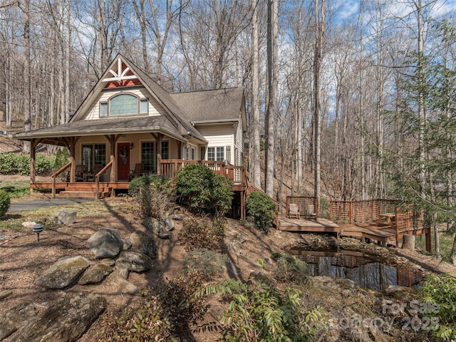 360 Laurel Ridge Rd, Maggie Valley, NC 28751 - rear view of house with roof with shingles, covered porch, and a deck