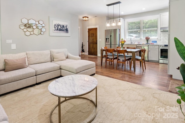 living room with wood finished floors