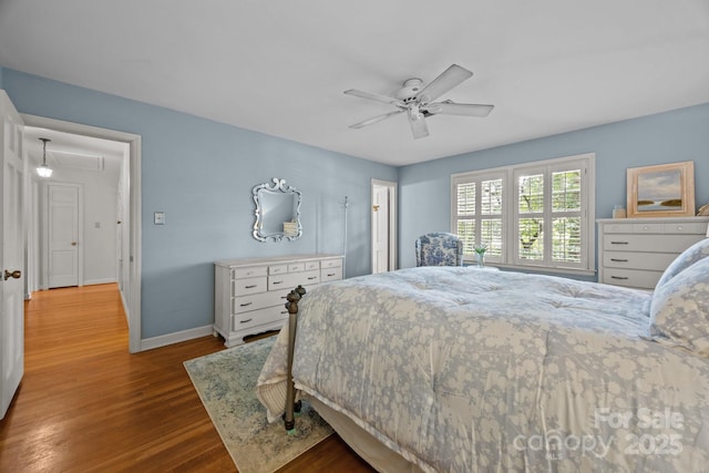 5510 Sardis Rd, Charlotte, NC 28270 - bedroom featuring wood finished floors, baseboards, attic access, and a ceiling fan