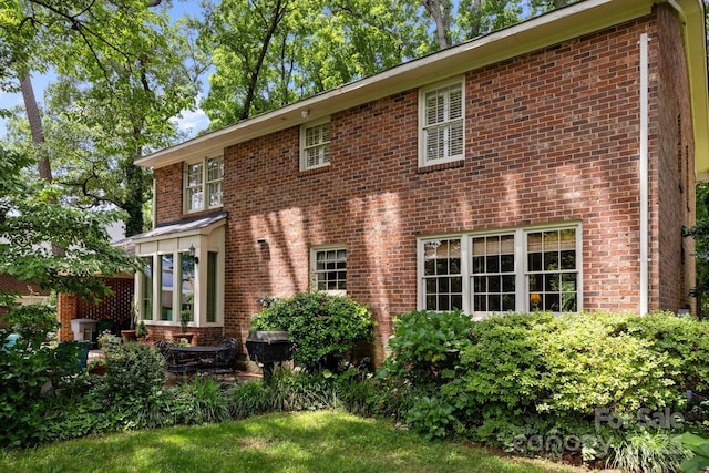 5510 Sardis Rd, Charlotte, NC 28270 - view of front facade with brick siding and a patio