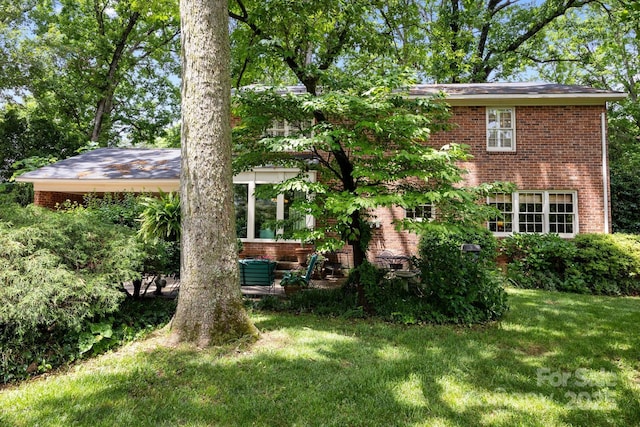 5510 Sardis Rd, Charlotte, NC 28270 - view of front of house featuring brick siding and a front yard