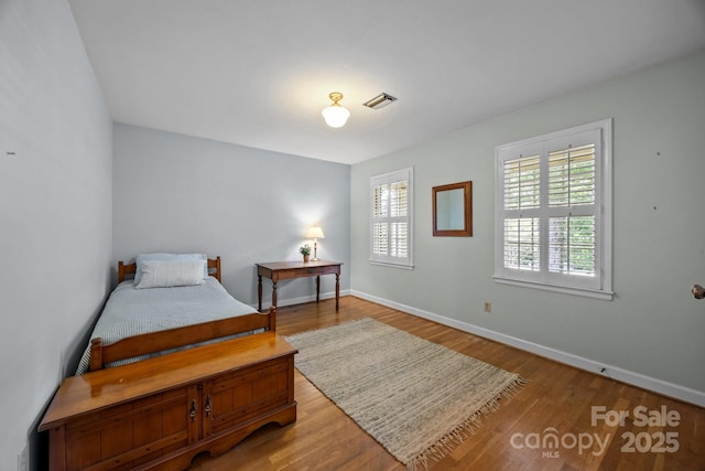 5510 Sardis Rd, Charlotte, NC 28270 - bedroom featuring wood finished floors and baseboards