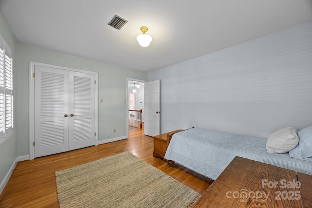 5510 Sardis Rd, Charlotte, NC 28270 - bedroom with wood finished floors, baseboards, and a closet