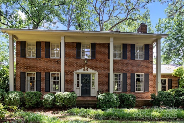 5510 Sardis Rd, Charlotte, NC 28270 - view of front of home with a chimney and brick siding
