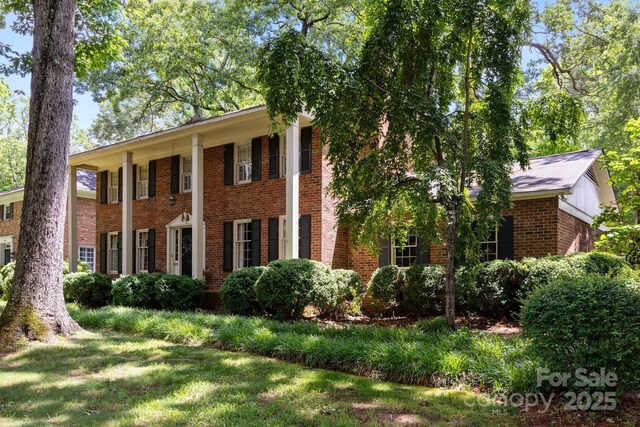 5510 Sardis Rd, Charlotte, NC 28270 - view of front of home featuring brick siding and a front lawn