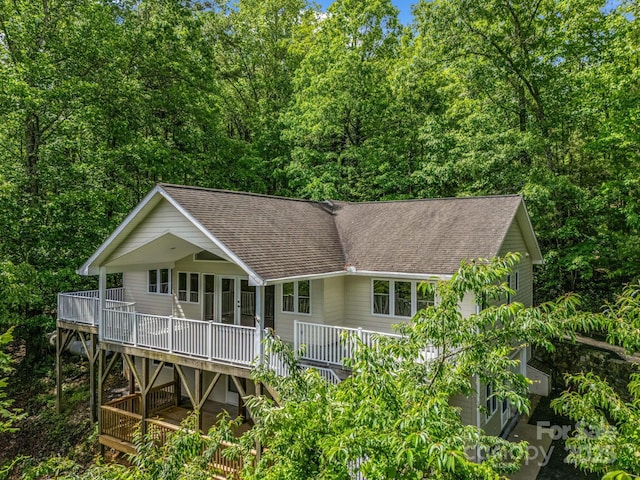 153 Old Lakey Gap Rd, Black Mountain, NC 28711 - back of house with a shingled roof, a wooden deck, and stairway