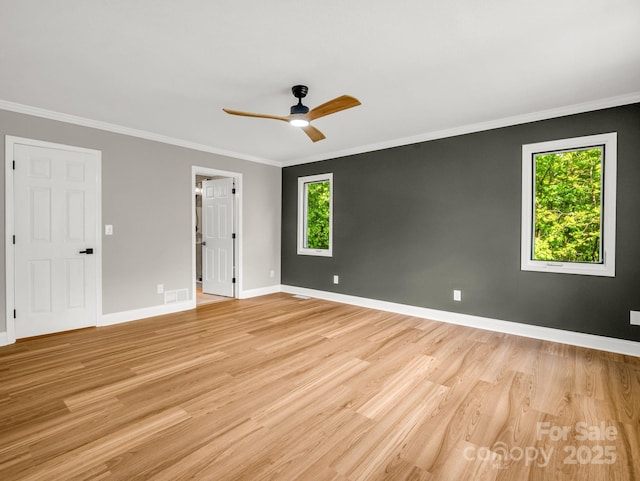 153 Old Lakey Gap Rd, Black Mountain, NC 28711 - unfurnished room featuring light wood-style flooring, ceiling fan, ornamental molding, and baseboards