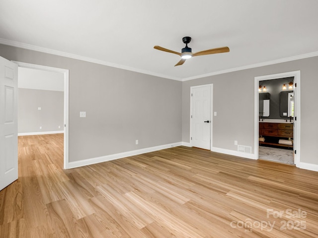 153 Old Lakey Gap Rd, Black Mountain, NC 28711 - unfurnished bedroom with light wood finished floors, ornamental molding, baseboards, ensuite bathroom, and ceiling fan