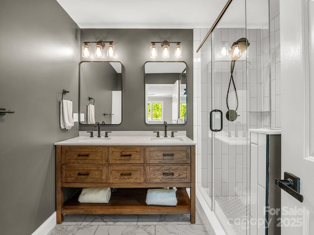 153 Old Lakey Gap Rd, Black Mountain, NC 28711 - full bathroom with marble look tiles, a shower stall, double vanity, and baseboards